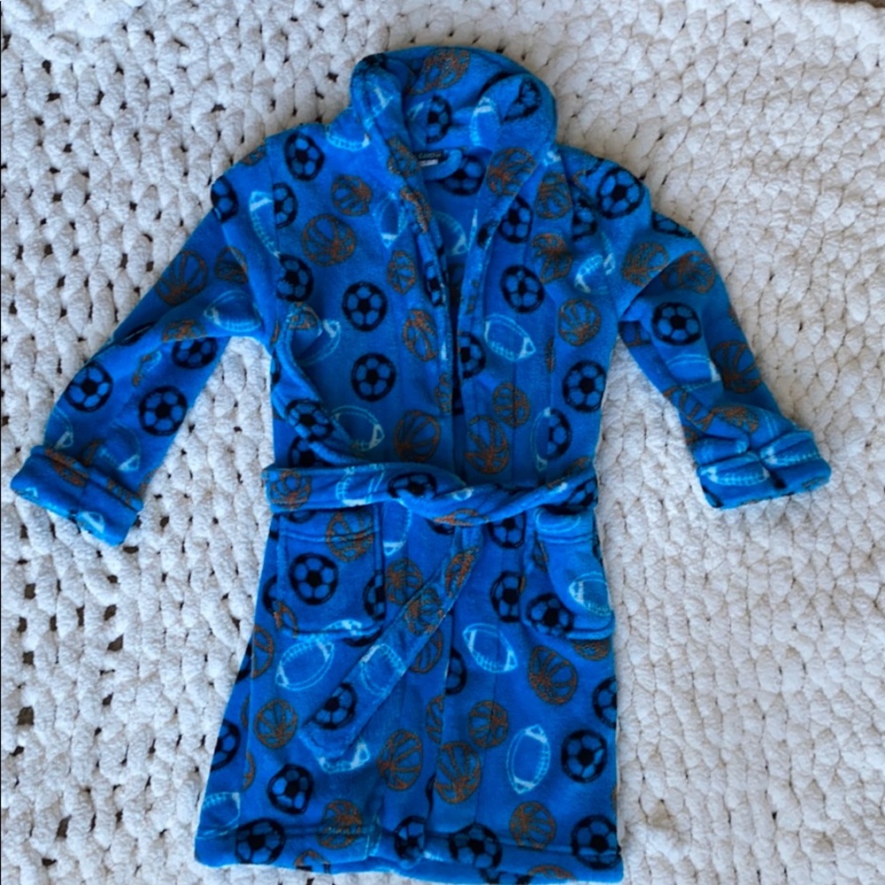 Kids sports plush robe. Never worn.